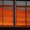 今日の夕景です。レストランスカイプラザの窓に旭岳上空の茜雲が反射して紅く染まりました。