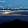 台風一過の夕刻　夕日どきに笠ヶ岳の上に光る雲が現れました　南岳山荘スタッフ撮影