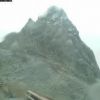9月26日　槍ヶ岳初冠雪　午前中一時期、雪やミゾレとなり、ライブカメラに頂上付近にだけ粉砂糖を振りかけたような槍ヶ岳が映し出されました。