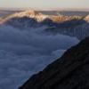 新雪の笠ヶ岳と穂高の山影 